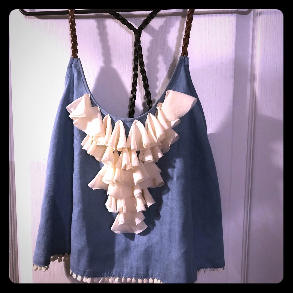 A very cute ruffled jean top.